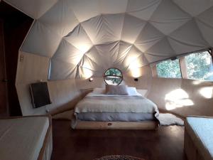 Katil atau katil-katil dalam bilik di Biosfera Lodge