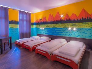 Postel nebo postele na pokoji v ubytování Sunflower Hostel Berlin