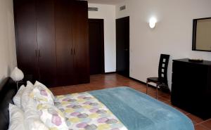 Posteľ alebo postele v izbe v ubytovaní El Casar Apartments