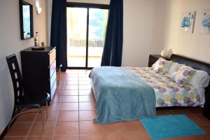 Posteľ alebo postele v izbe v ubytovaní El Casar Apartments