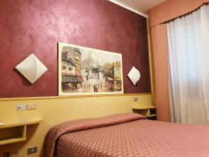 Postel nebo postele na pokoji v ubytování HOTEL PARADISO