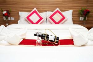 a hotel room with a bed with a camera on it at Hotel Splendid View in Pokhara