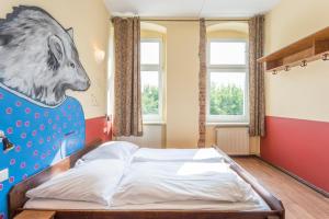 Postel nebo postele na pokoji v ubytování Sunflower Hostel Berlin