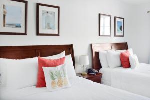 Postel nebo postele na pokoji v ubytování Beach Park Hotel