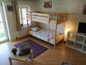 Postel nebo postele na pokoji v ubytování Sankt-Nikolaus City Studio