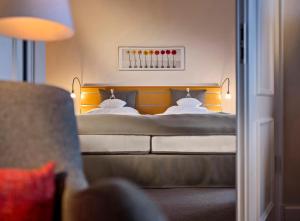 Postel nebo postele na pokoji v ubytování Hotel Rungholt