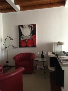 Ein Sitzbereich in der Unterkunft Casa Vacanza Castagna
