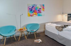 Postel nebo postele na pokoji v ubytování Hotel Rungholt