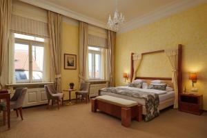 Posteľ alebo postele v izbe v ubytovaní Ventana Hotel Prague