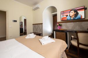 Antico Hotel Moderno客房内的一张或多张床位