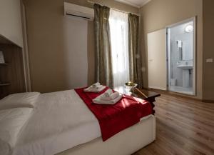 Antico Hotel Moderno客房内的一张或多张床位