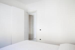 Posteľ alebo postele v izbe v ubytovaní Airone Residence