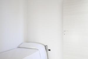 Posteľ alebo postele v izbe v ubytovaní Airone Residence