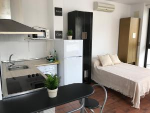Kuchyň nebo kuchyňský kout v ubytování Atico/Loft en Zona Céntrica V