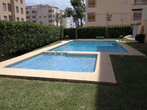 The swimming pool at or close to Precioso atico cerca de denia. wifi gratis.