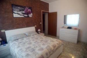 Postel nebo postele na pokoji v ubytování Casa Graziella