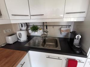 Kuchyň nebo kuchyňský kout v ubytování Apartamento Carihuela Torremolinos