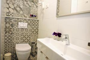 Łazienka w obiekcie Hotel Delfin