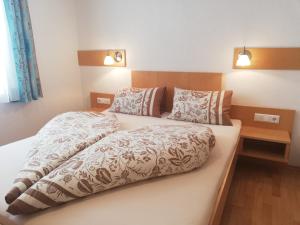Postel nebo postele na pokoji v ubytování Ködnitzhof