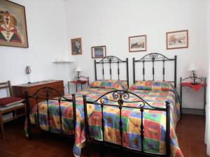 
A bed or beds in a room at La Yucca
