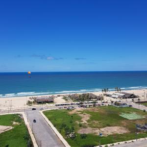 an aerial view of the beach and the ocean at Reservafor in Fortaleza