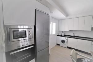 Kuchnia lub aneks kuchenny w obiekcie APARTAMENTO RIALTO 2