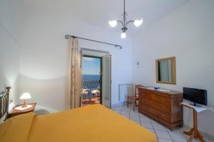 A bed or beds in a room at Villamena