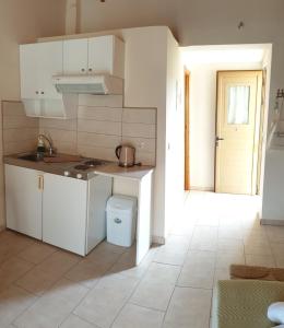 Kuchyň nebo kuchyňský kout v ubytování Epi Apartments