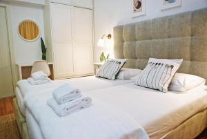 Łóżko lub łóżka w pokoju w obiekcie Hotel Delfin