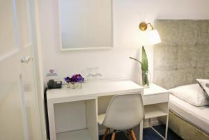 Łóżko lub łóżka w pokoju w obiekcie Hotel Delfin