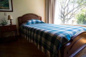 Voodi või voodid majutusasutuse Hostal Bogotá Real toas