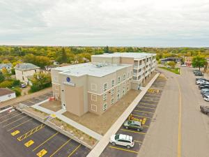 an aerial view of a building with a parking lot at The Souris Hotel in Souris