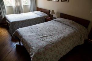Voodi või voodid majutusasutuse Hostal Bogotá Real toas