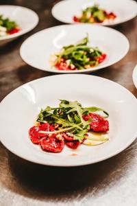 a white plate of food on a table at Boonoona Ski Lodge in Perisher Valley