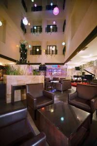 The lounge or bar area at ASTON Pontianak Hotel and Convention Center