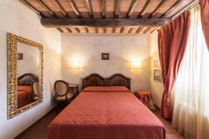 Postel nebo postele na pokoji v ubytování Hotel Cavalieri Del Mare + 37 fotografií