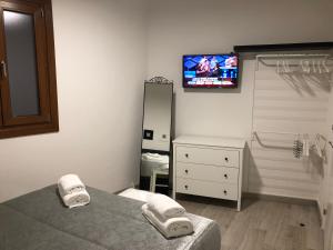 Postel nebo postele na pokoji v ubytování Apartamento Toledo San Justo