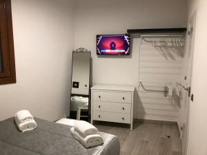 Postel nebo postele na pokoji v ubytování Apartamento Toledo San Justo