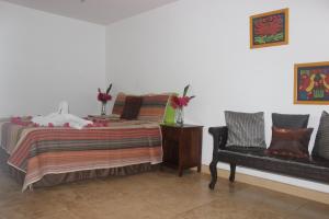 Een bed of bedden in een kamer bij mame trees