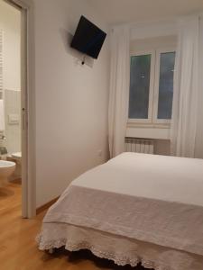 Ένα ή περισσότερα κρεβάτια σε δωμάτιο στο Casa Vacanze "Colle Bandiera"