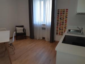 Η κουζίνα ή μικρή κουζίνα στο Casa Vacanze "Colle Bandiera"