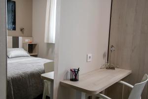 A bed or beds in a room at Alojamiento Turistico La Casa del tio Cesar