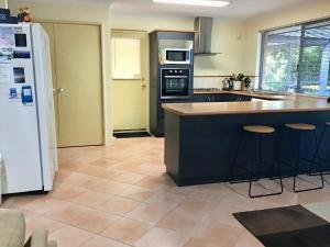 
A kitchen or kitchenette at Bussell Retreat
