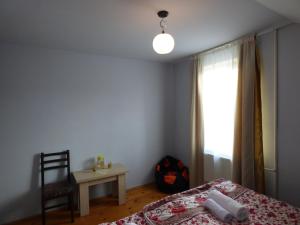 Ένα ή περισσότερα κρεβάτια σε δωμάτιο στο Anano Guest House