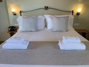 Ліжко або ліжка в номері Hotel David