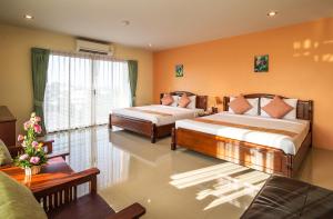 Postel nebo postele na pokoji v ubytování Krabi Phetpailin Hotel + 33 fotografií