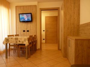 TV a/nebo společenská místnost v ubytování Residence Alba Nova