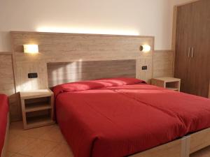 Postel nebo postele na pokoji v ubytování Residence Alba Nova