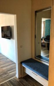 A television and/or entertainment centre at Moment Apartments