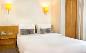 Cama o camas de una habitación en Ilkay Hotel